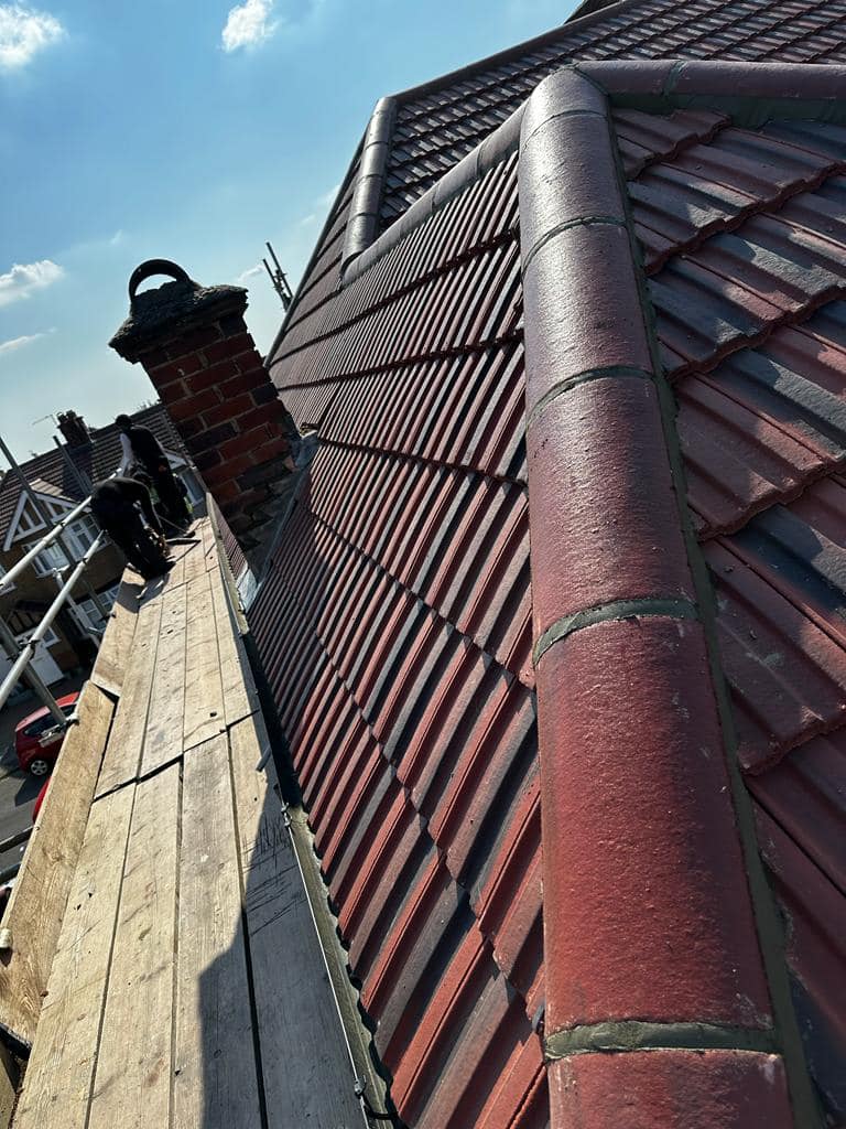 Professional roofers working on a property in London - KS Roof Master