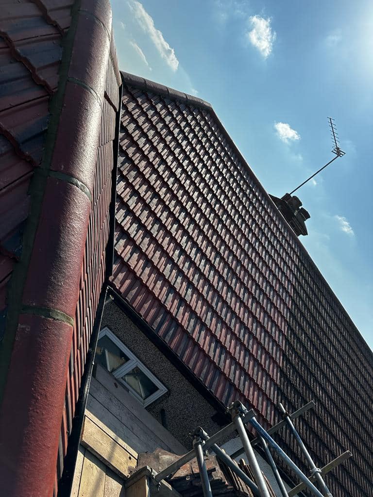 Professional roofers working on a property in London - KS Roof Master