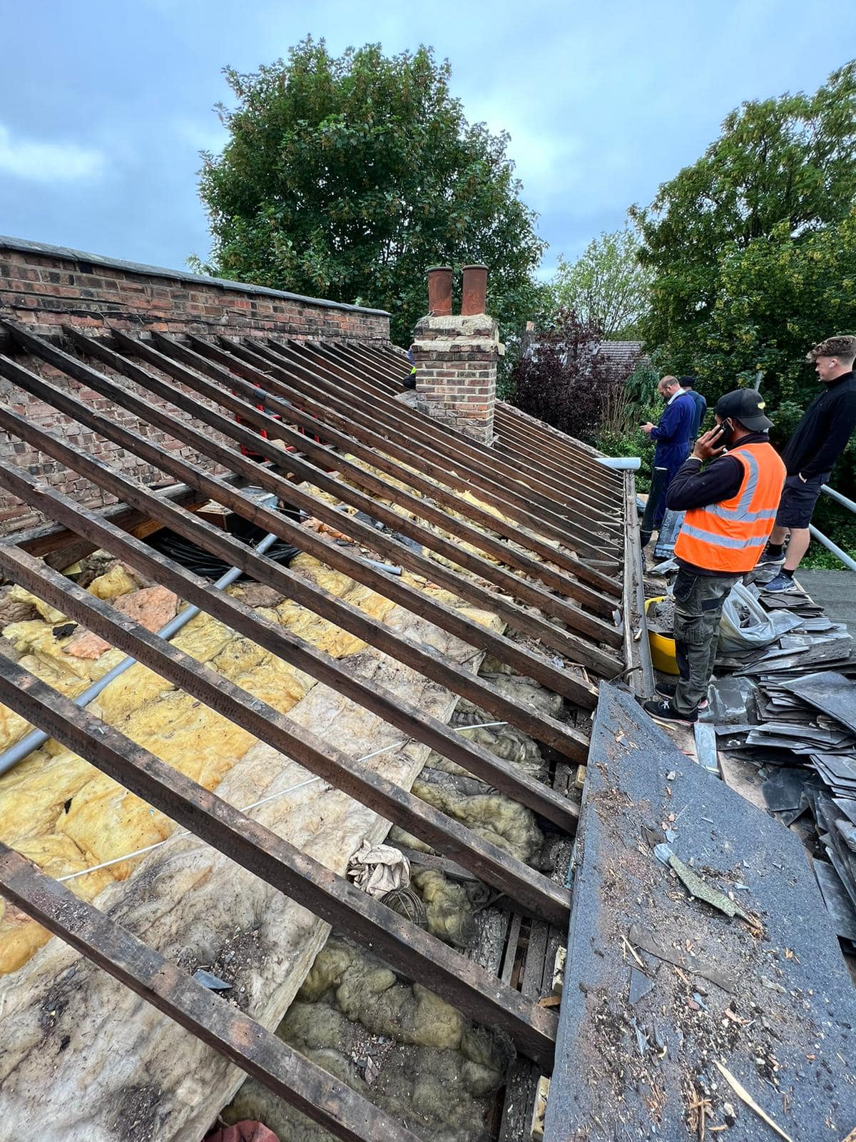 Professional roofers working on a property in London - KS Roof Master