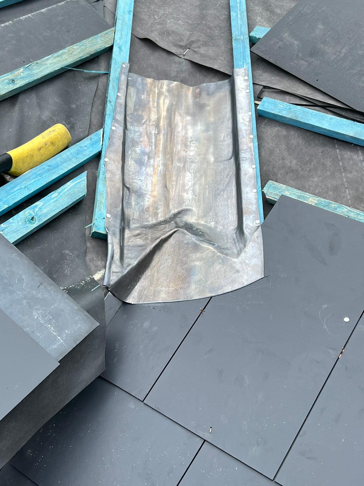 Professional roofers working on a property in London - KS Roof Master