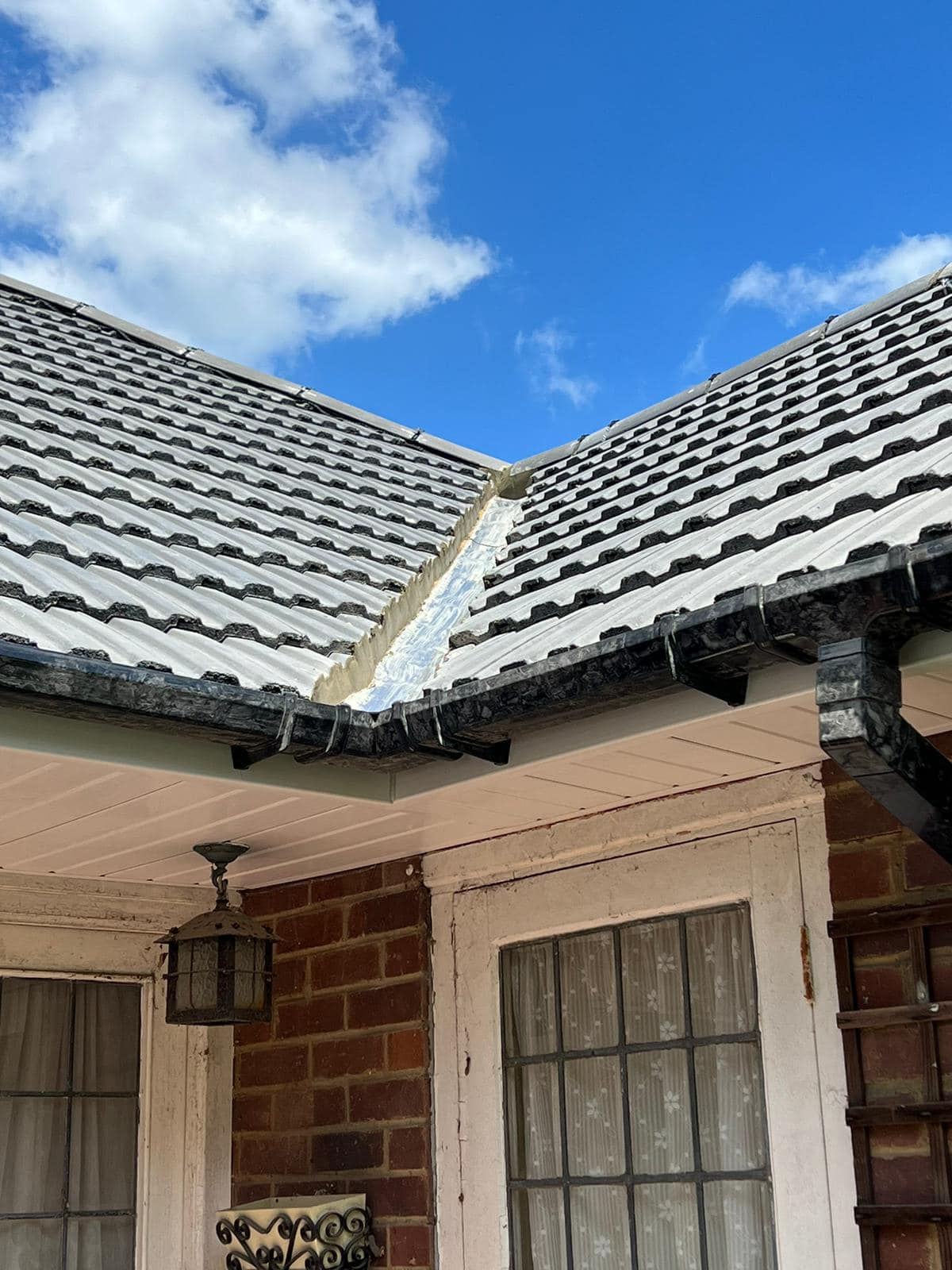 Professional roofers working on a property in London - KS Roof Master