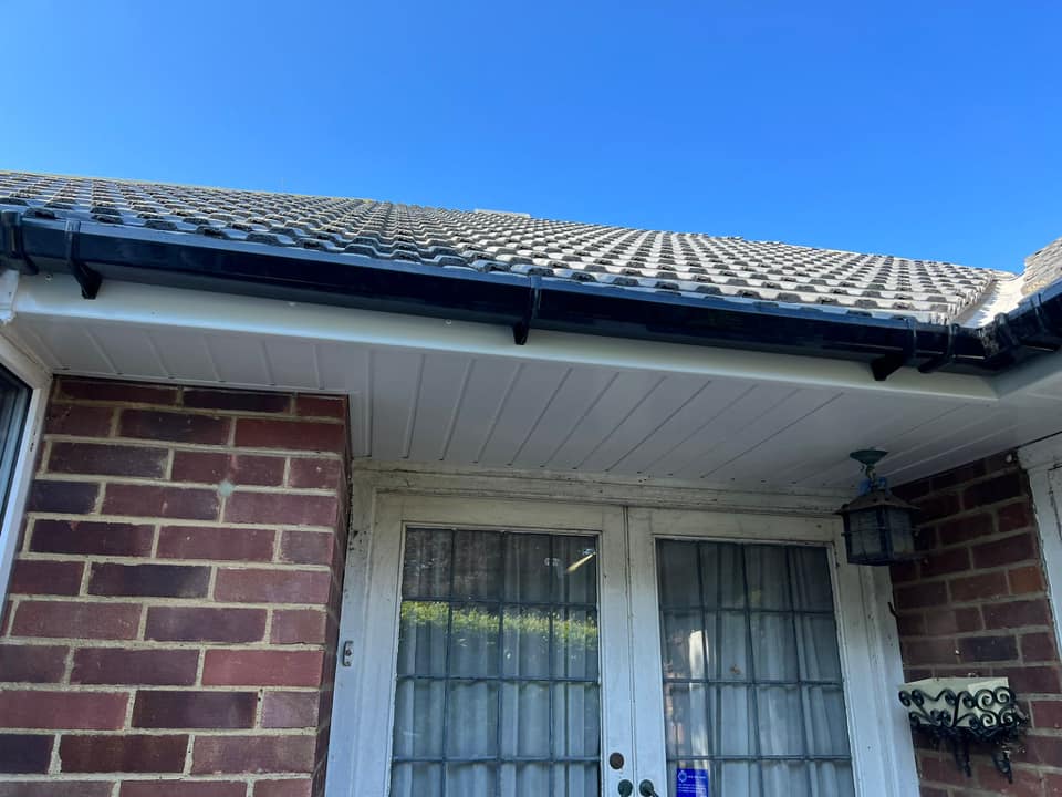 Professional roofers working on a property in London - KS Roof Master