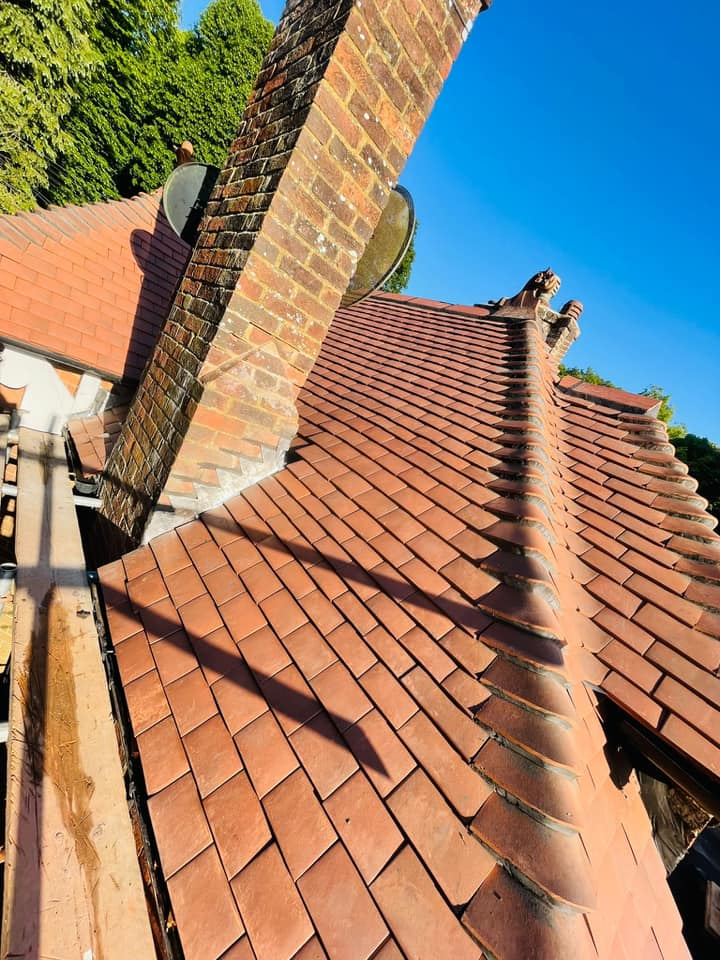 Professional roofers working on a property in London - KS Roof Master