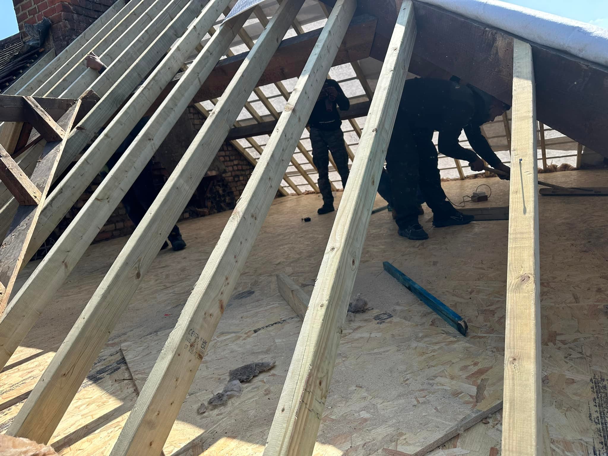 Professional roofers working on a property in London - KS Roof Master