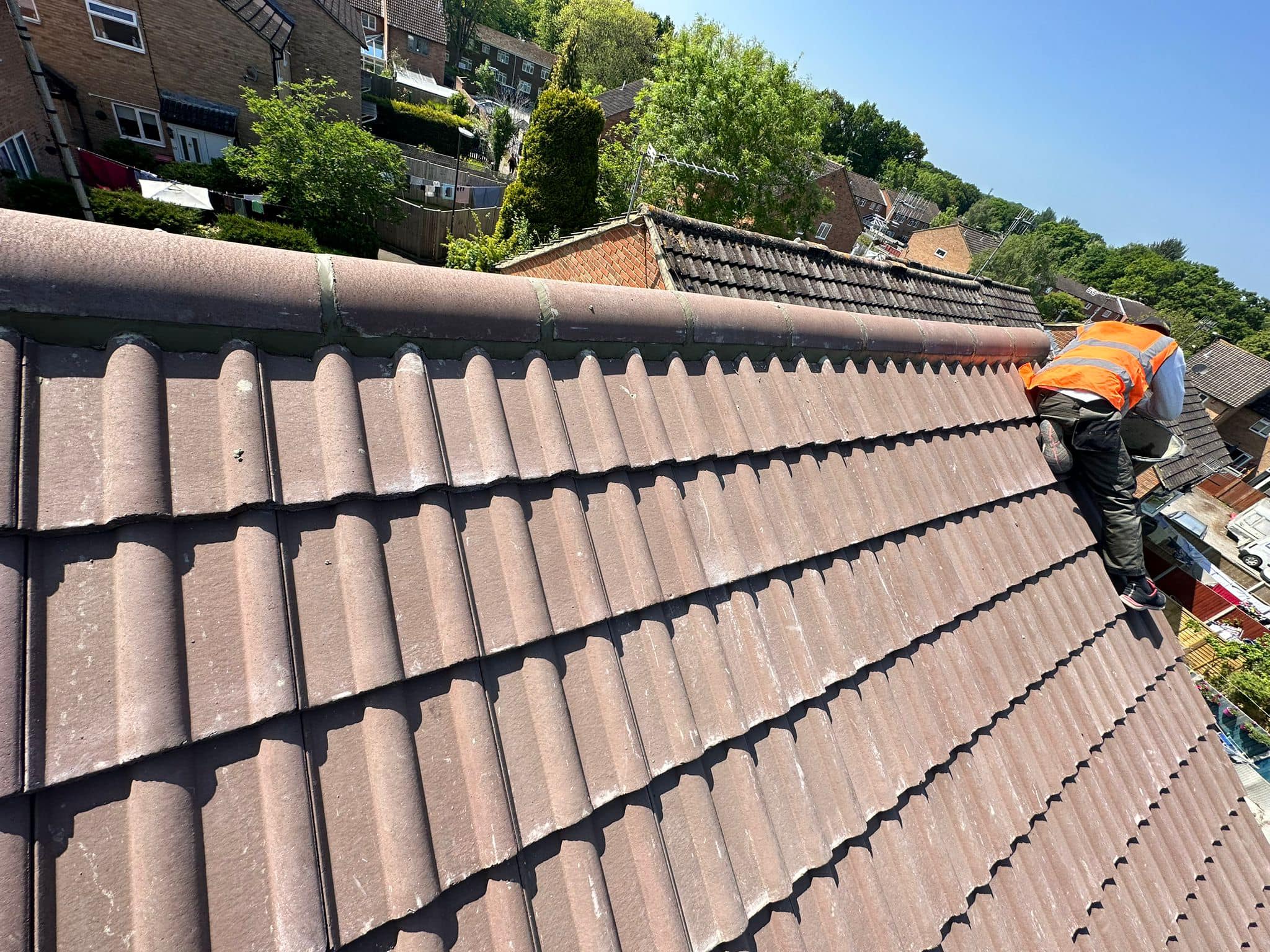 Professional roofers working on a property in London - KS Roof Master