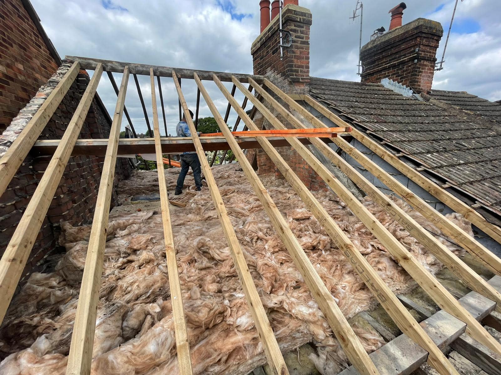 Professional roofers working on a property in London - KS Roof Master