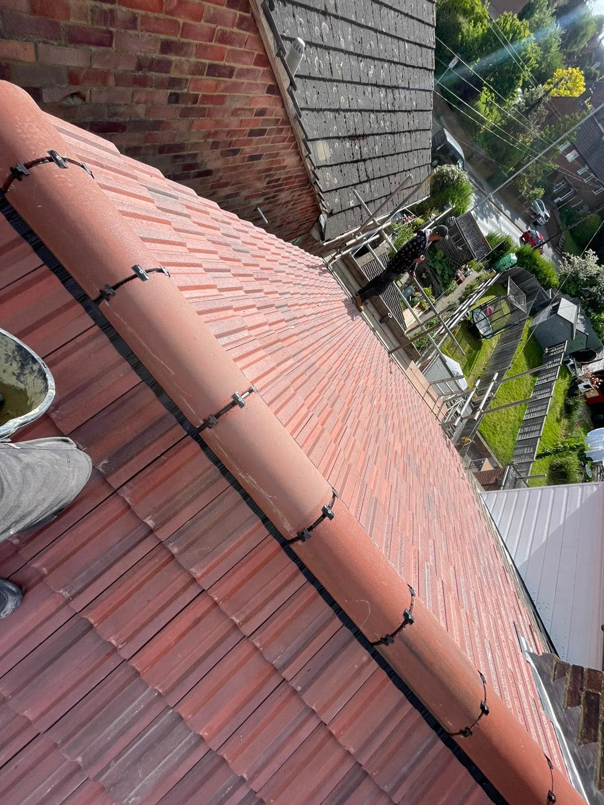 Professional roofers working on a property in London - KS Roof Master