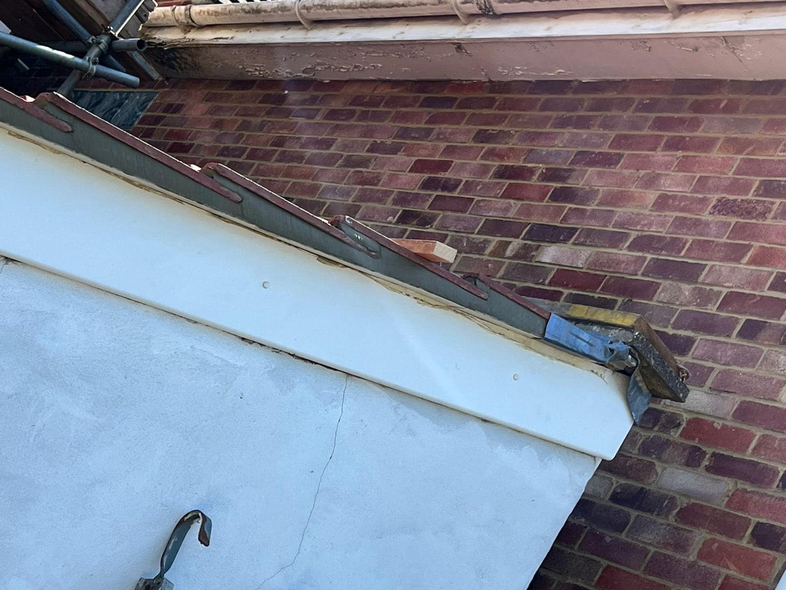 Professional roofers working on a property in London - KS Roof Master