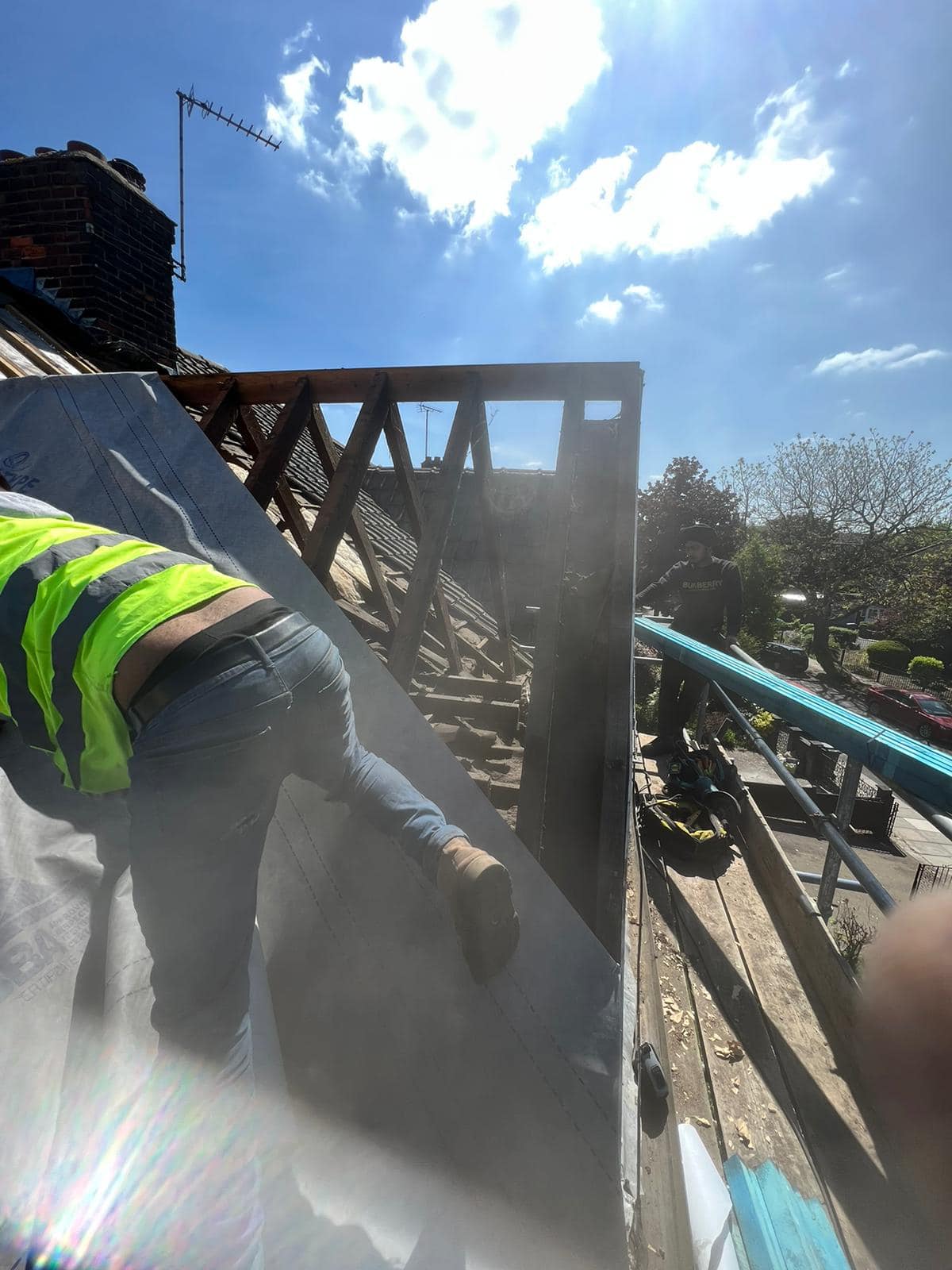 Professional roofers working on a property in London - KS Roof Master