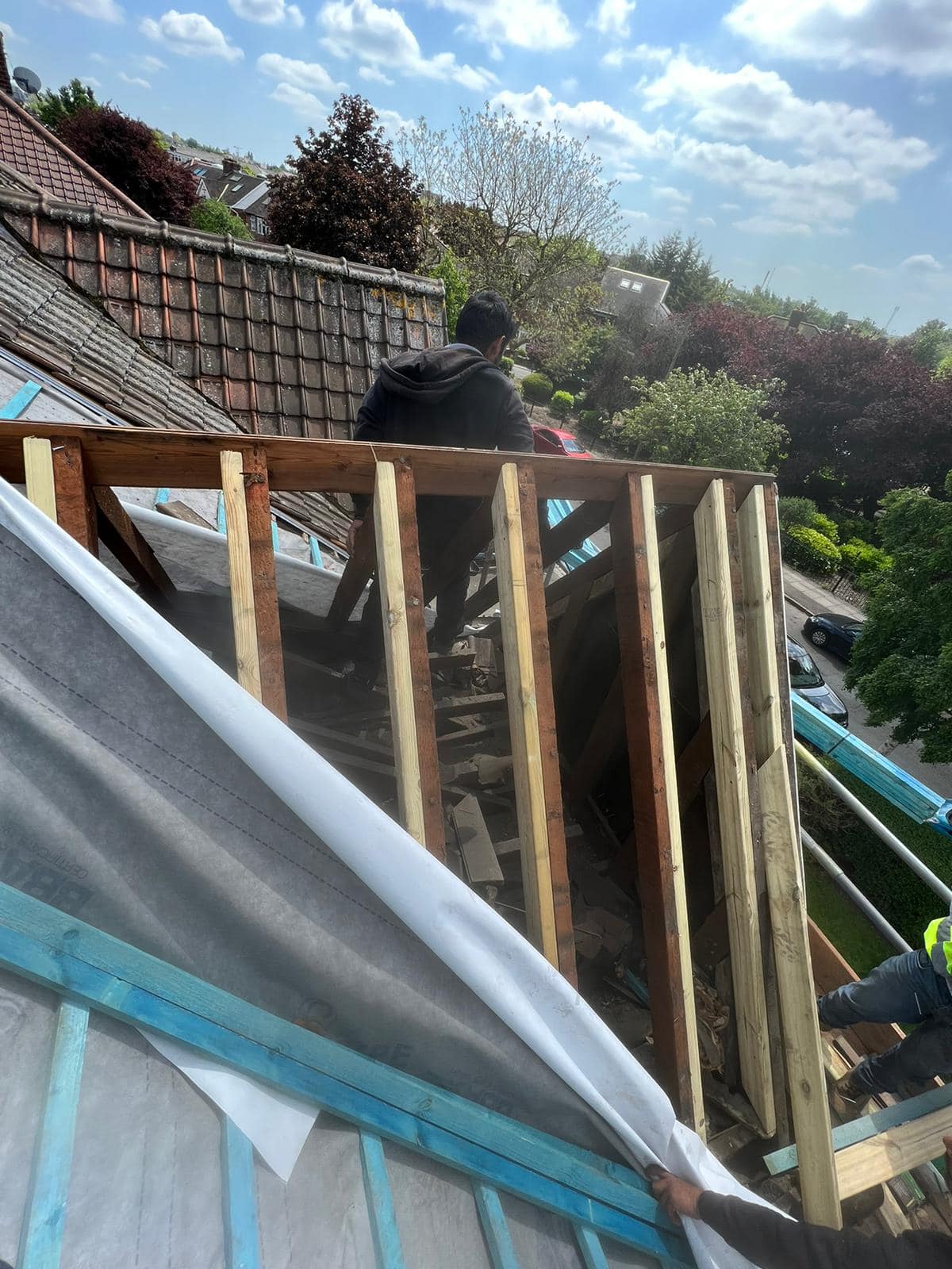 Professional roofers working on a property in London - KS Roof Master