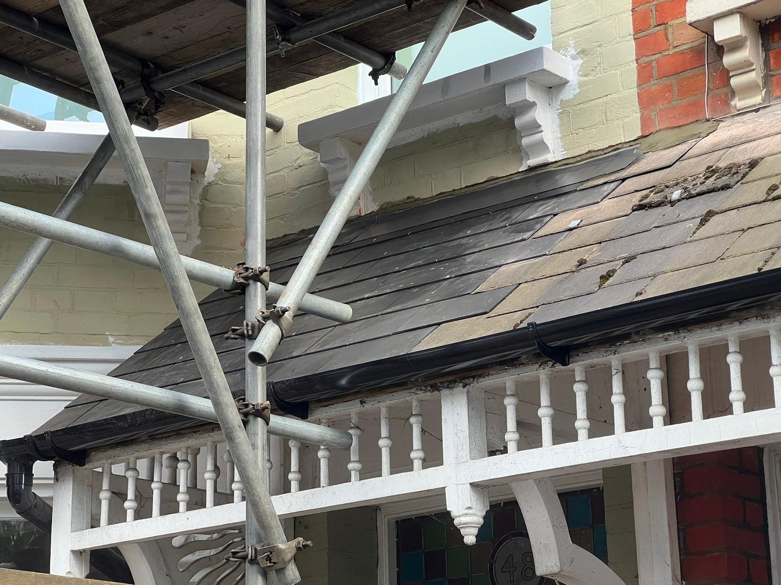 Professional roofers working on a property in London - KS Roof Master