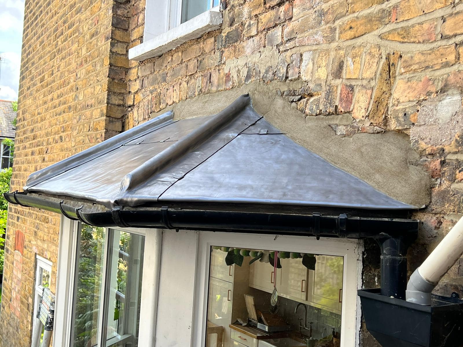 Flat roof coating in Brixton