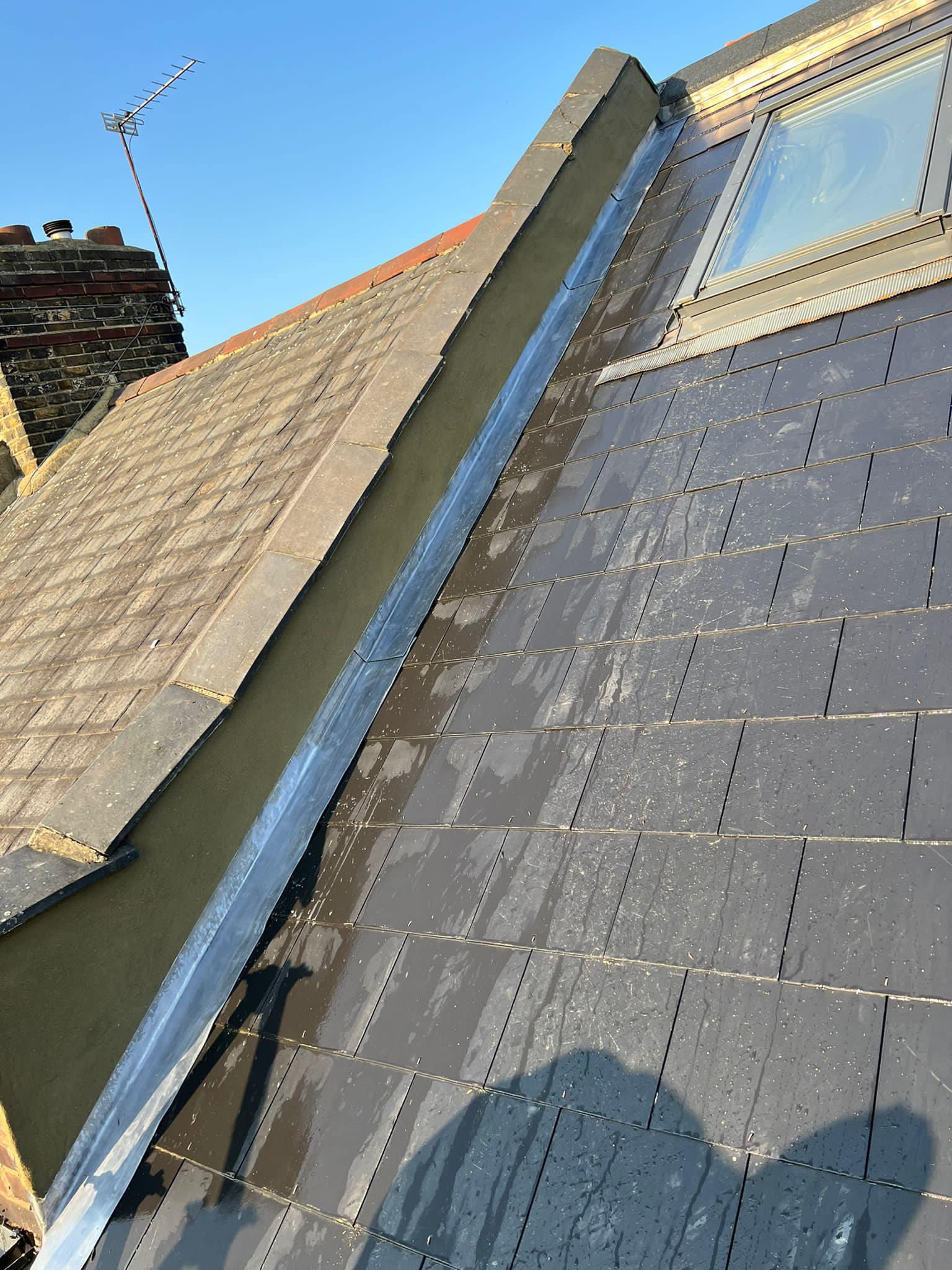 Professional roofers working on a property in London - KS Roof Master