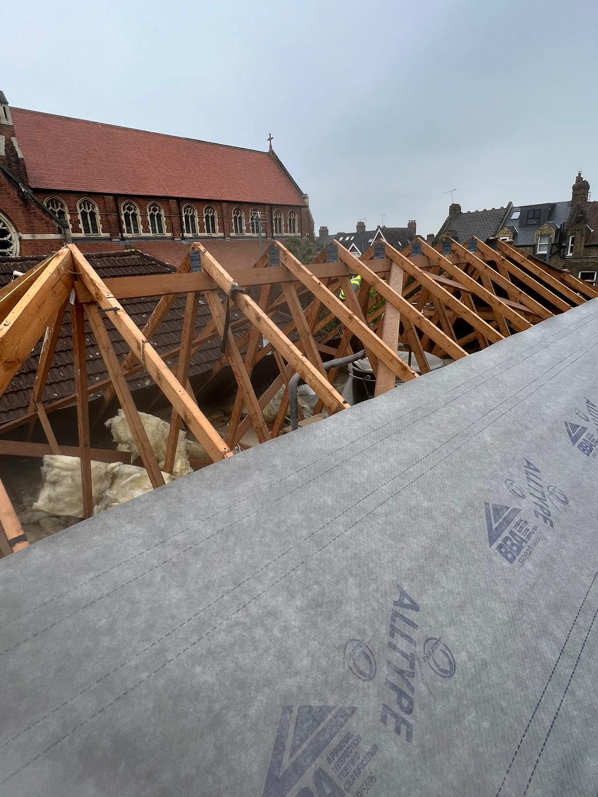 Professional roofers working on a property in London - KS Roof Master