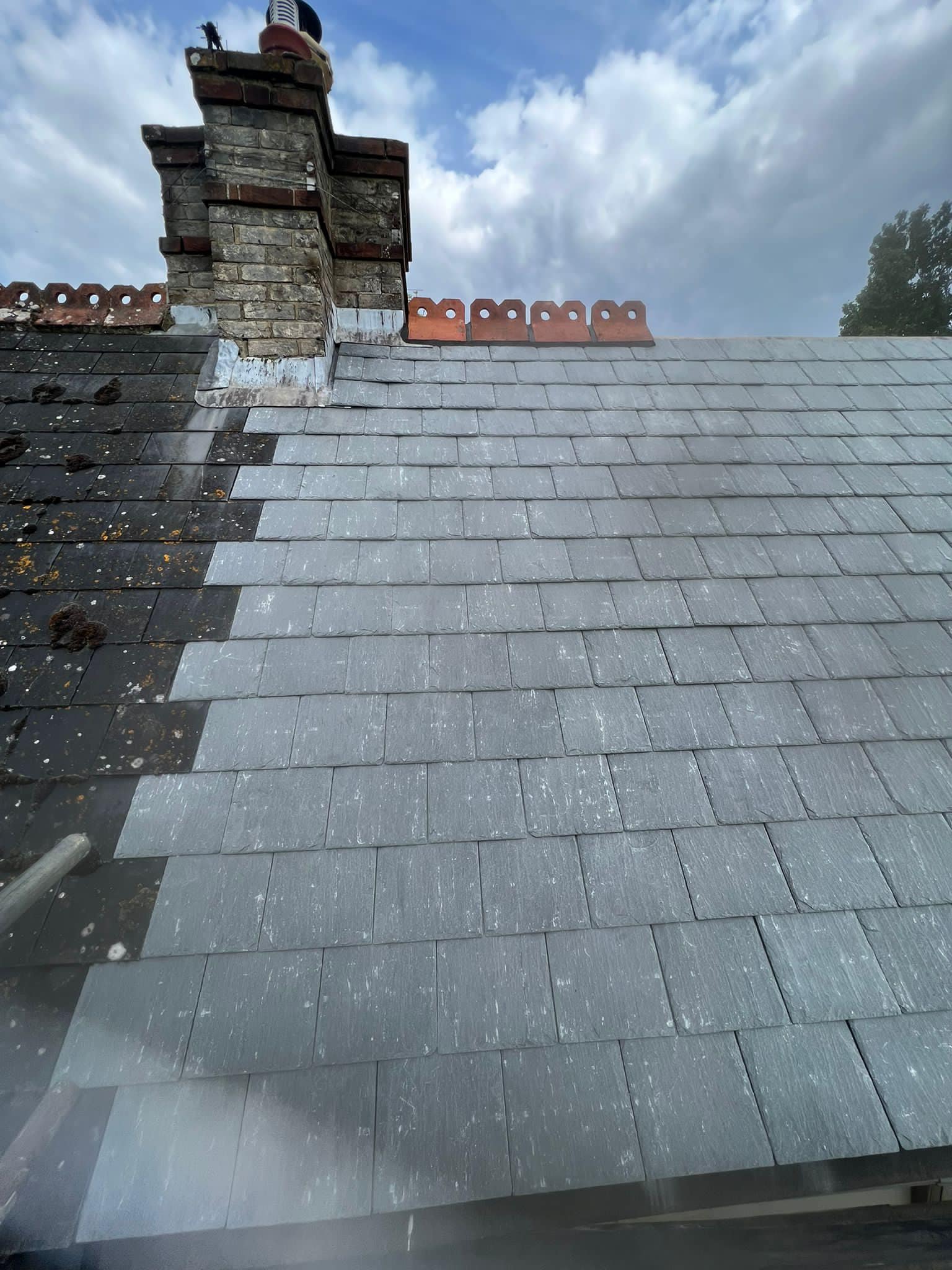 Professional roofers working on a property in London - KS Roof Master