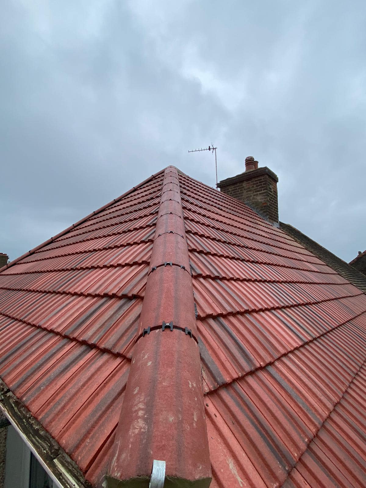Professional roofers working on a property in London - KS Roof Master