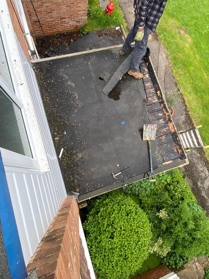 Professional roofers working on a property in London - KS Roof Master