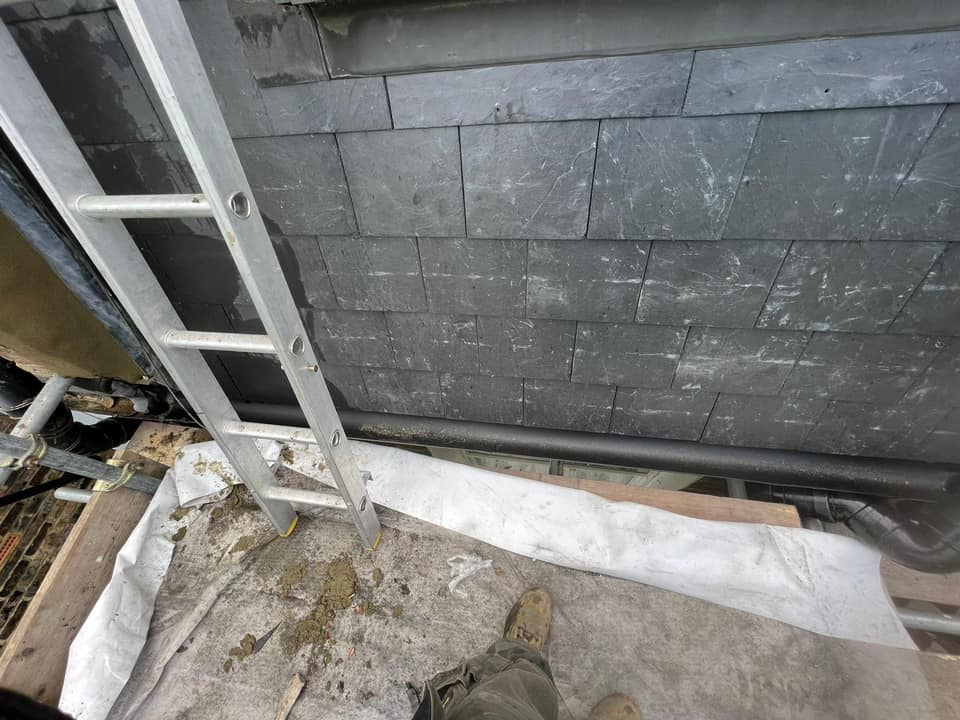 Professional roofers working on a property in London - KS Roof Master