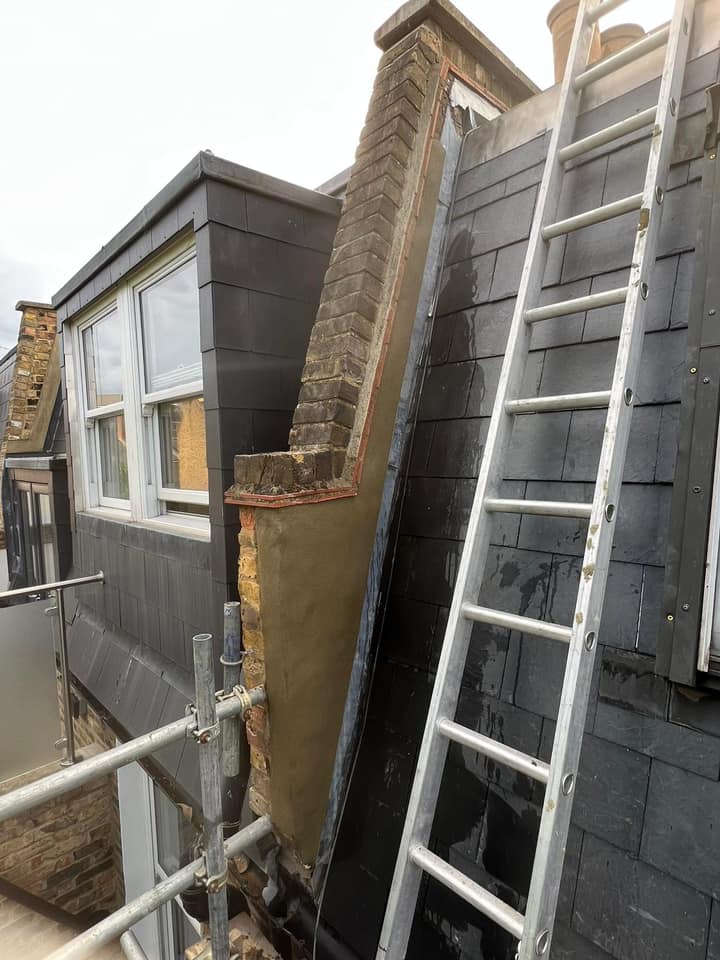 Professional roofers working on a property in London - KS Roof Master