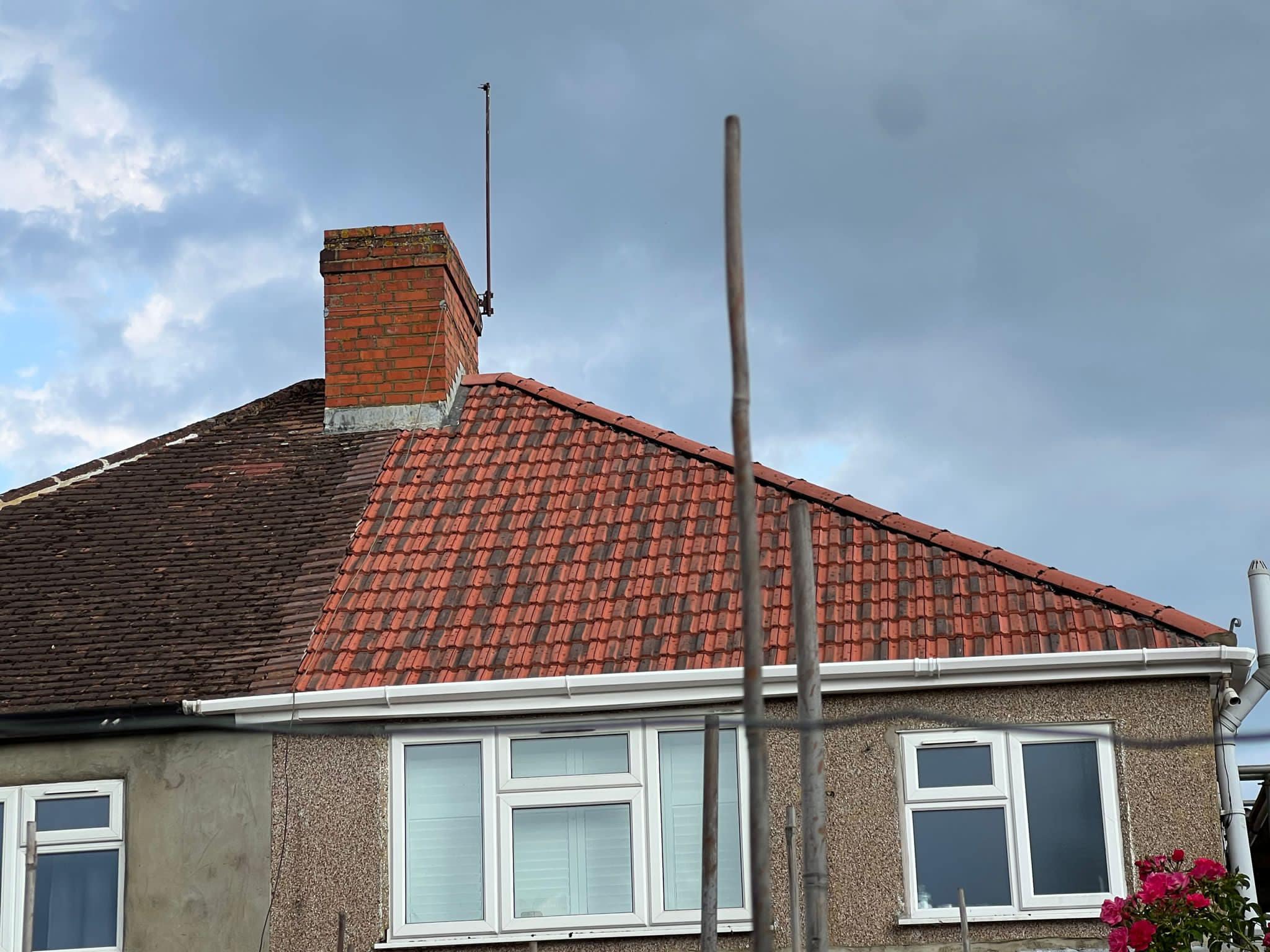 Professional roofers working on a property in London - KS Roof Master
