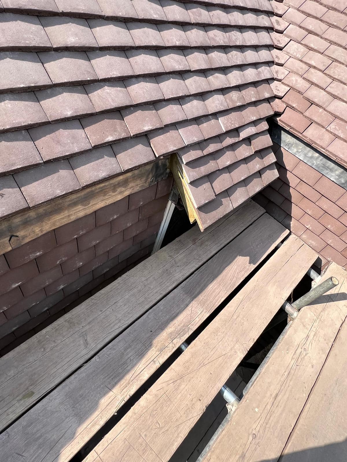 Professional roofers working on a property in London - KS Roof Master