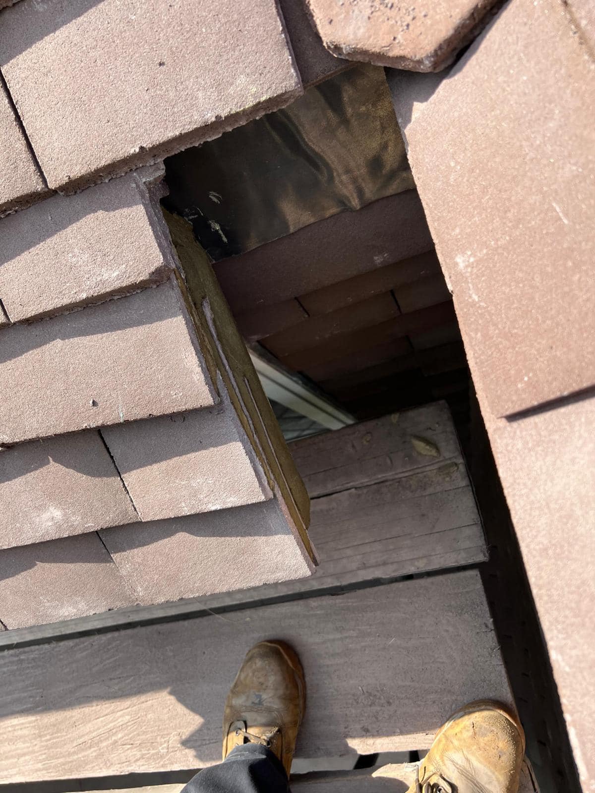 Professional roofers working on a property in London - KS Roof Master