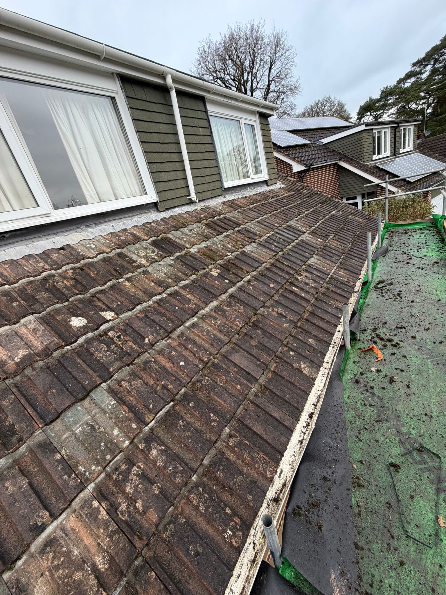 Professional roofers working on a property in London - KS Roof Master