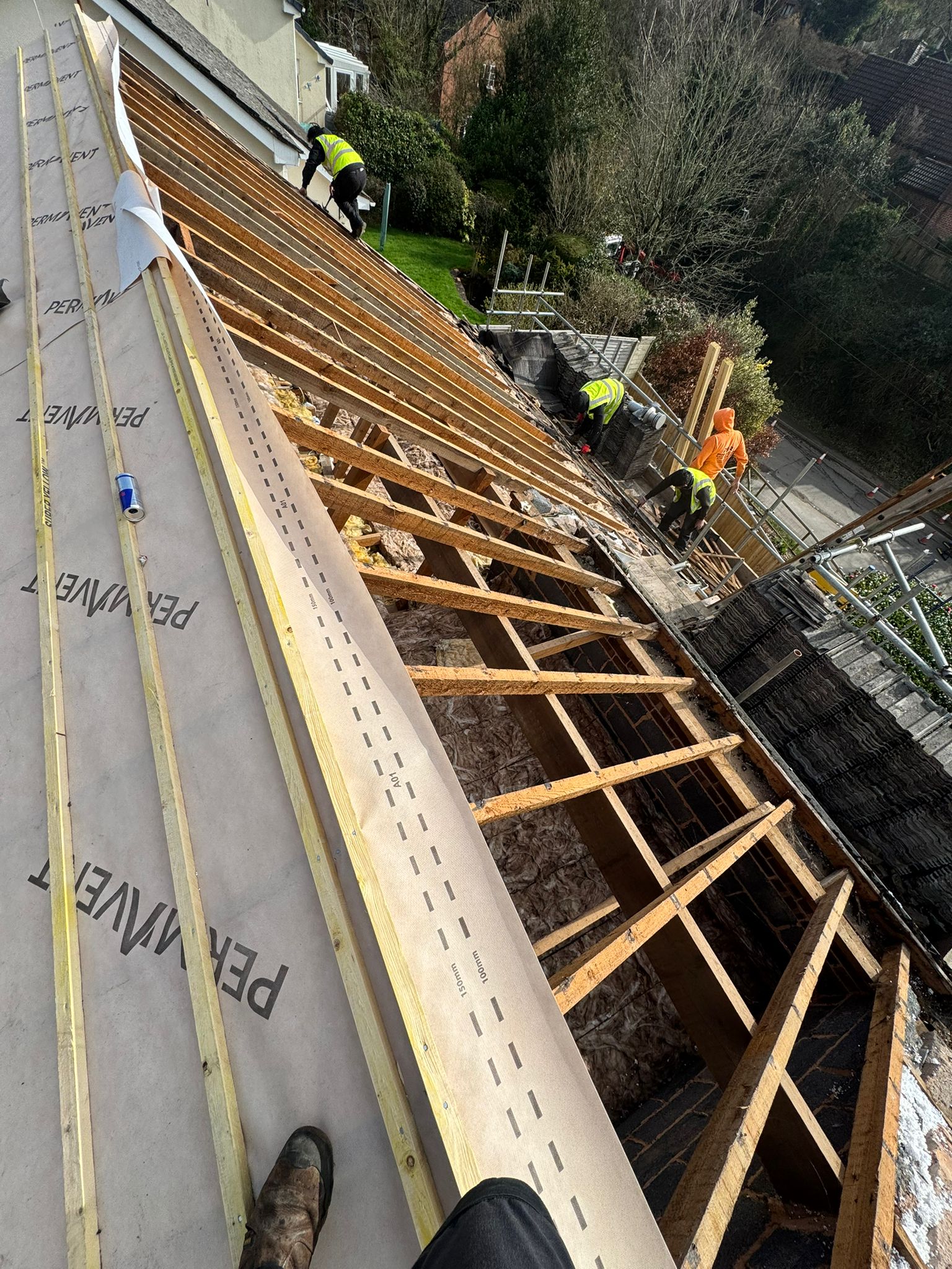 Professional roofers working on a property in London - KS Roof Master