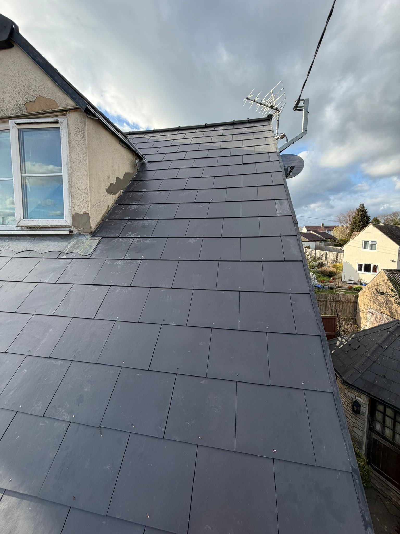 Professional roofers working on a property in London - KS Roof Master