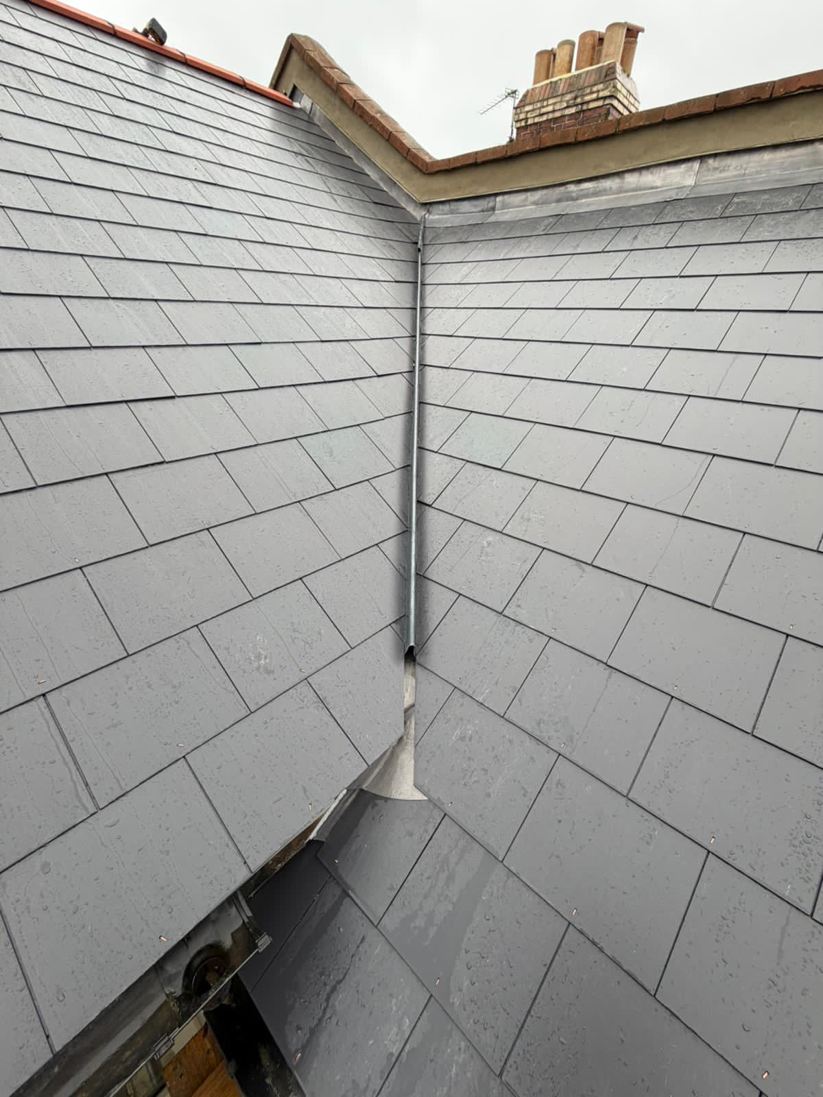 Professional roofers working on a property in London - KS Roof Master