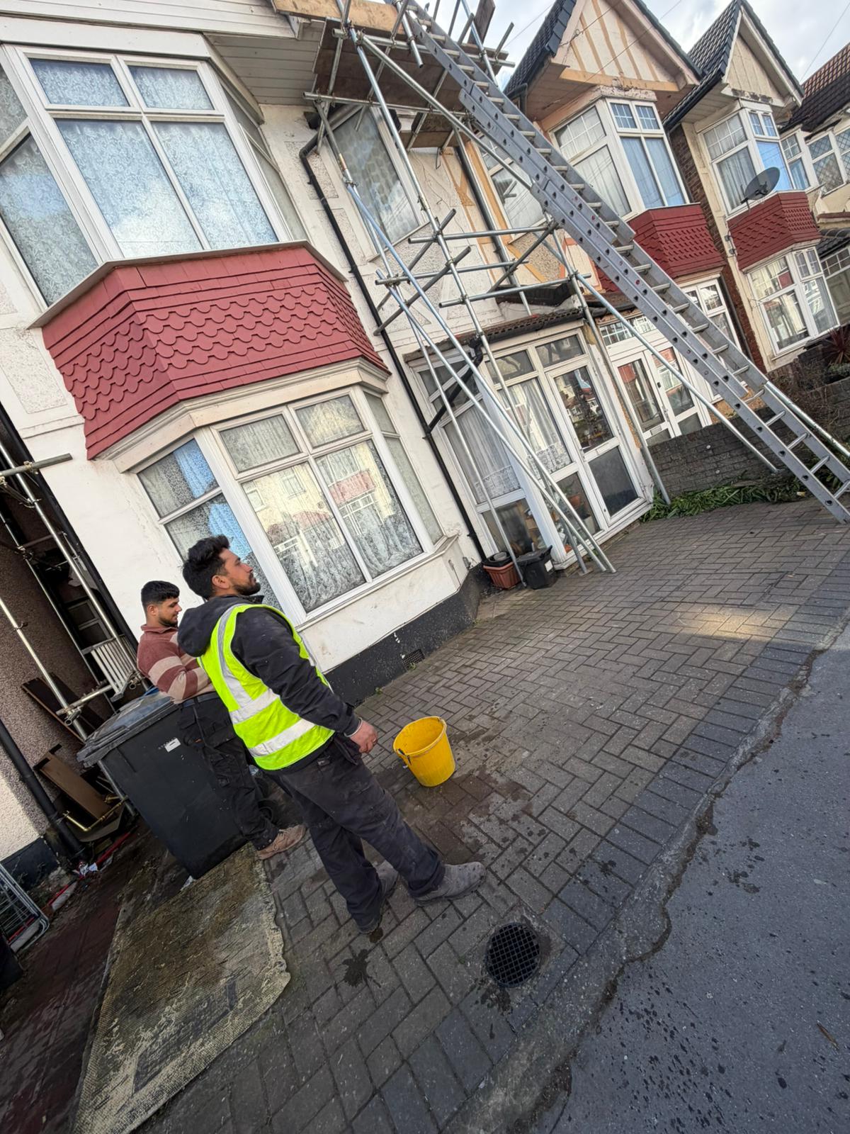 Professional roofers working on a property in London - KS Roof Master